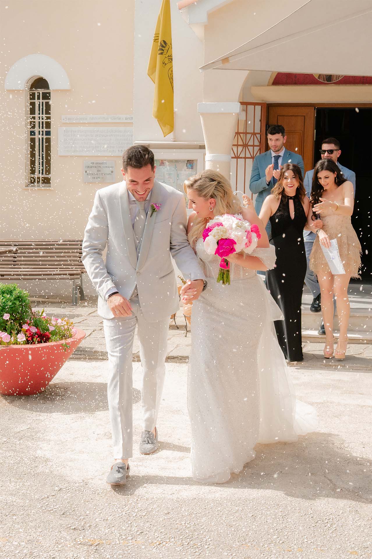 Valia and Simone exchanging vows during their wedding ceremony in Thessaloniki.